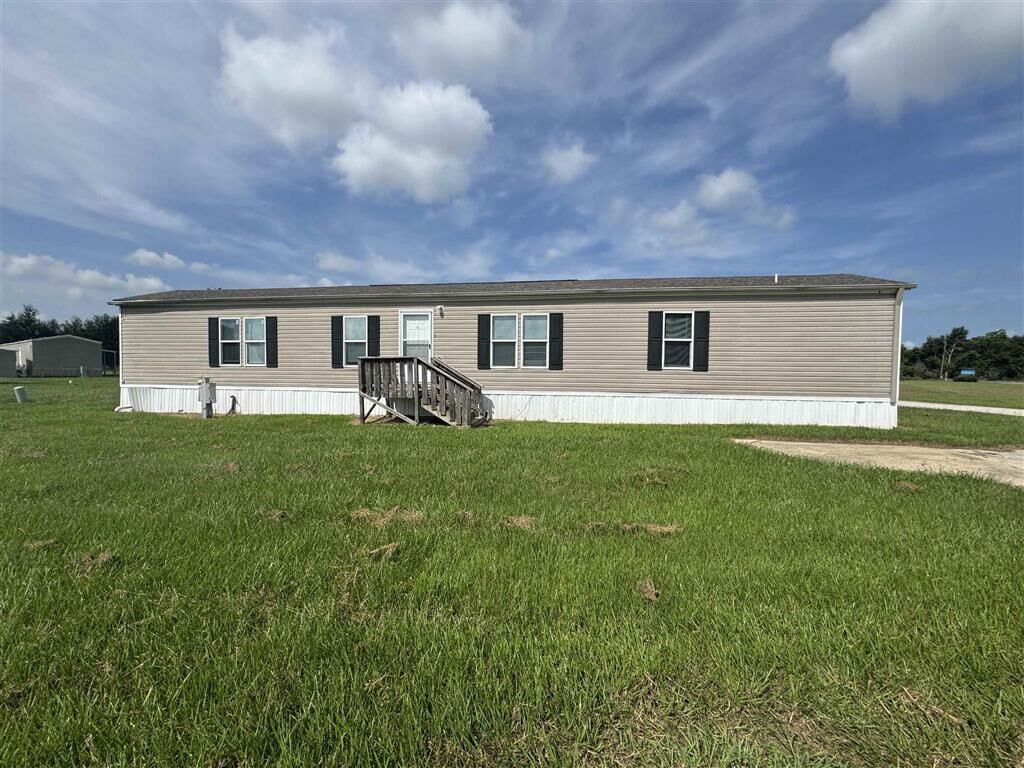 Property Photo:  583 I-10 Mobile Village Road 54  LA 70615 