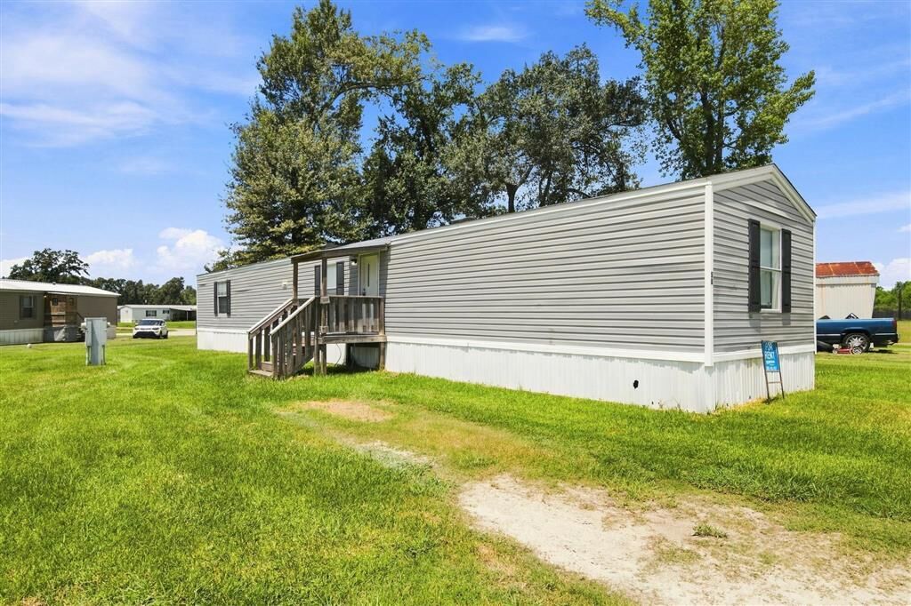 Property Photo:  583 I-10 Mobile Village Road 58  LA 70615 