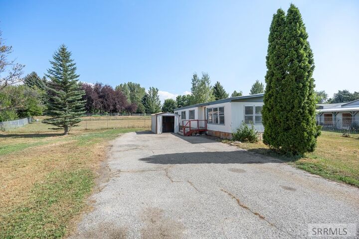 Property Photo:  814 Dalmation Drive  ID 83402 