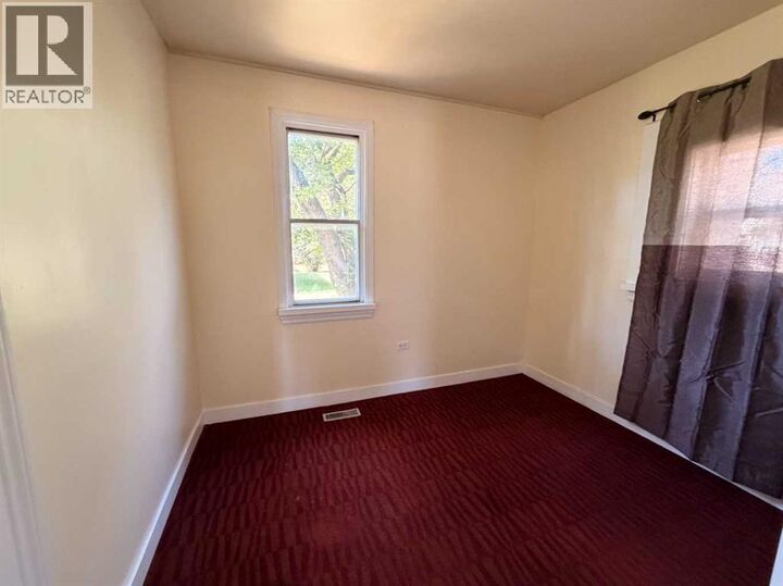 Property Photo: 737 6 Avenue AB T9W 1C2