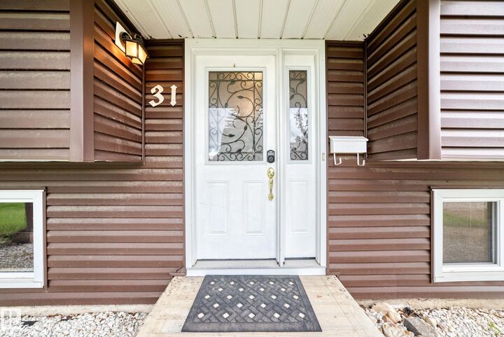 Property Photo:  31 Hughes Road NW  AB T5A 4E1 