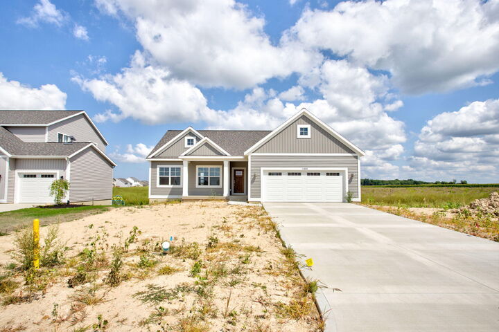 Property Photo: 11665 Cherrybud Drive MI 49424