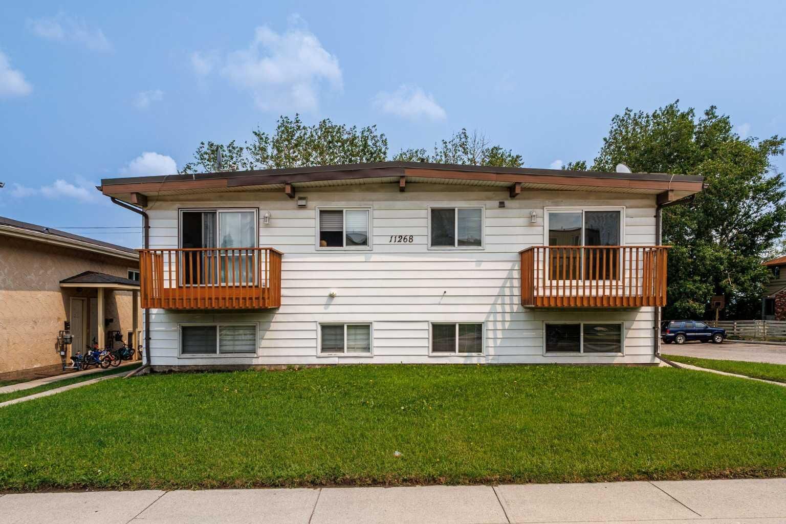 Property Photo: 11268 6 SW AB T2W 1V9