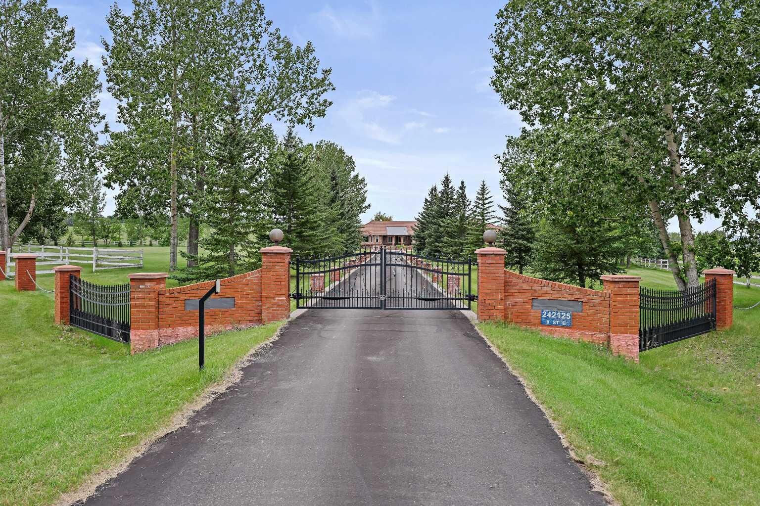 Property Photo: 242125 8 Street E AB T1S 3L2