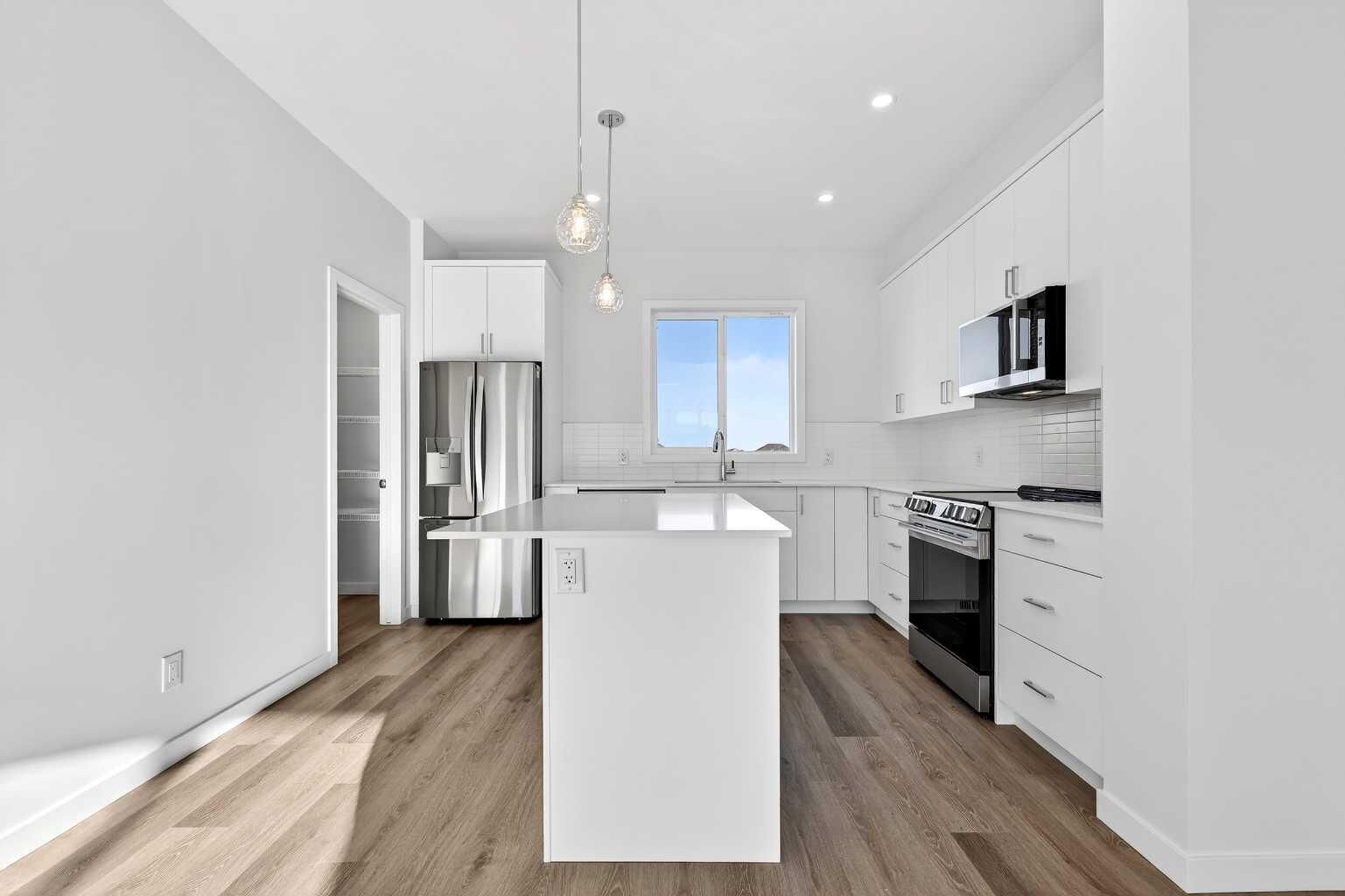 Property Photo: 12 Hotchkiss Parade SE AB T3S 0X5