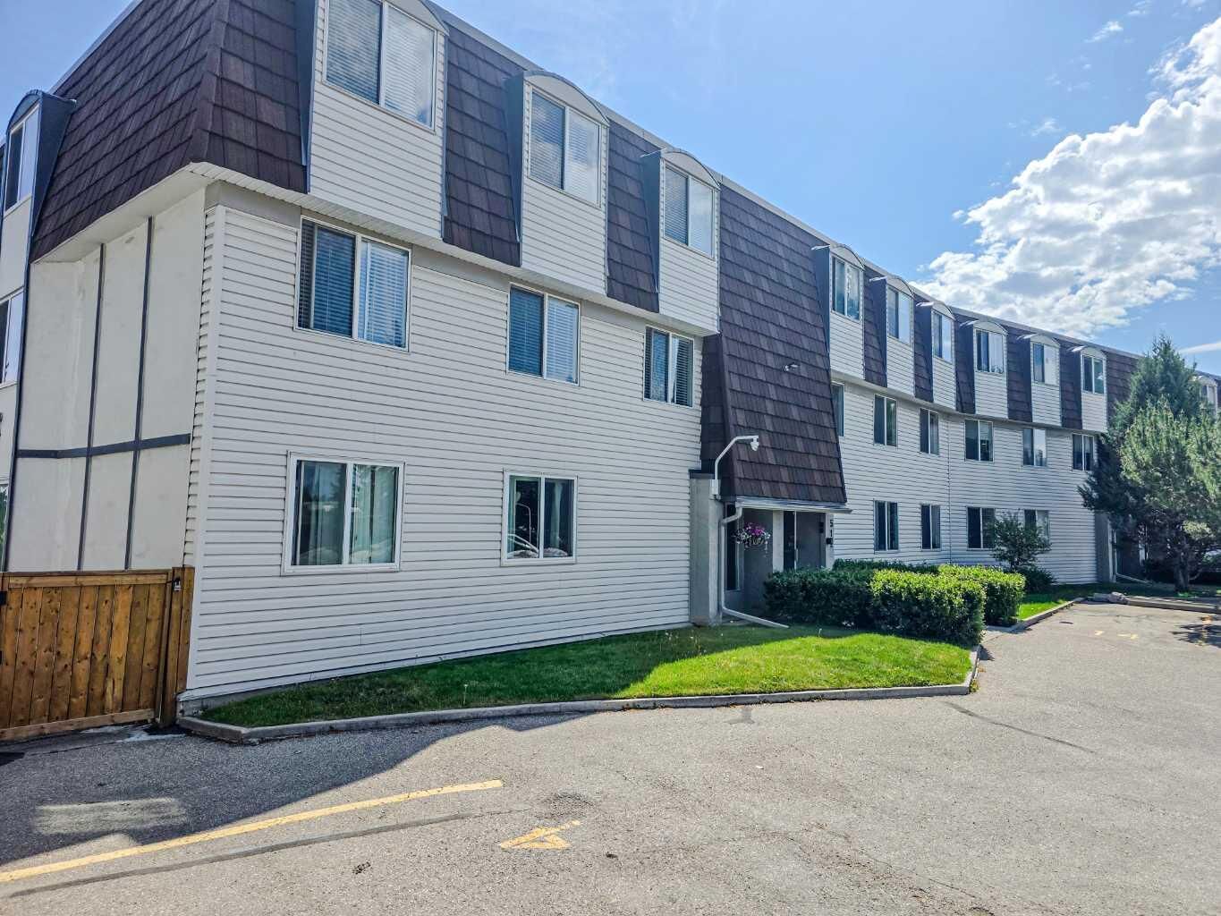 Property Photo:  512 Cedar Crescent SW 201  AB T3C 2Y8 