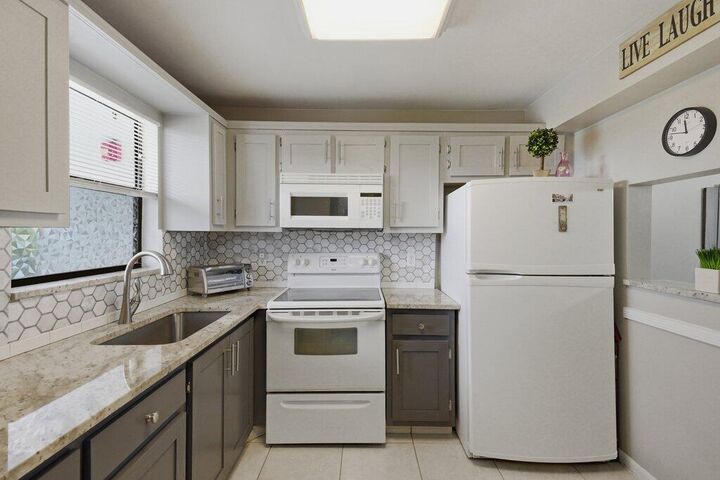 Property Photo:  4640 Lucerne Lakes Boulevard W 404  FL 33467 