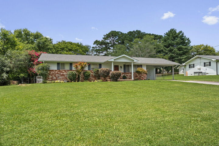 Property Photo: 3909 Sycamore Drive NW TN 37312