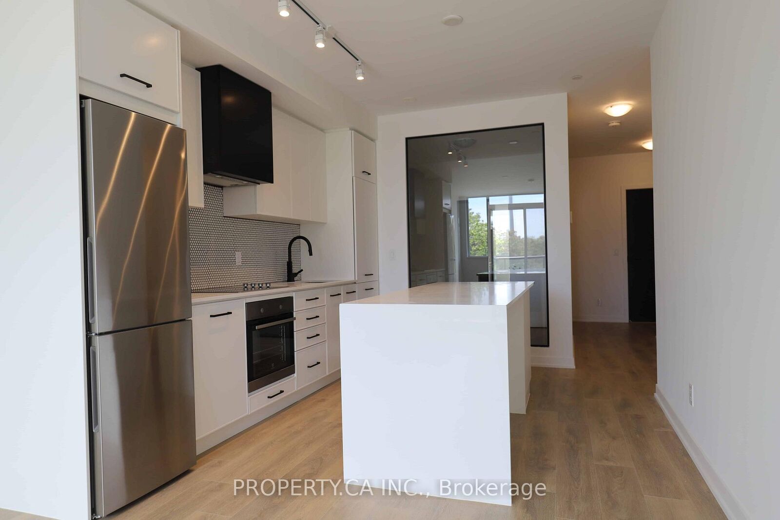 Property Photo: 899 Queen Street E 410 ON M4M 0C8