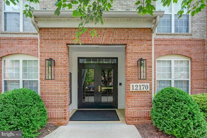 Property Photo:  12170 Abington Hall Place 303  VA 20190 