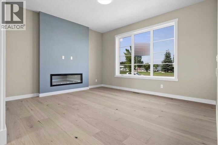 Property Photo:  406 River Avenue  AB T4C 3B8 