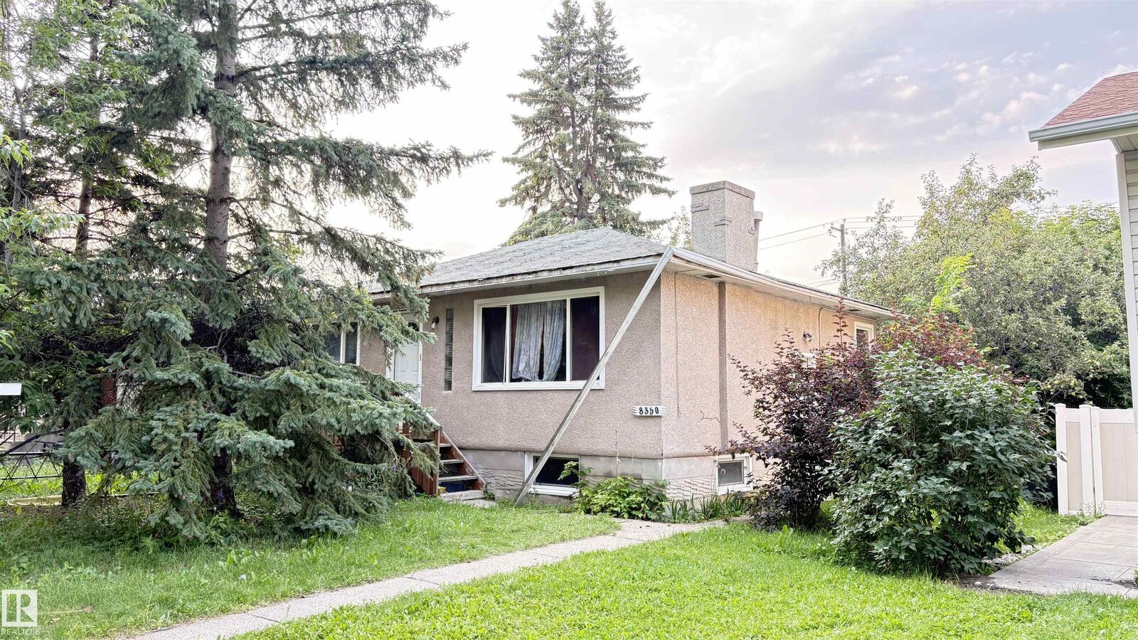 Property Photo:  8350 81 Avenue NW  AB T6C 0W2 