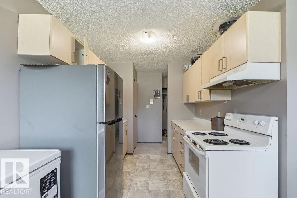 Property Photo: 13452 Fort Road NW 3 AB T5A 1C5