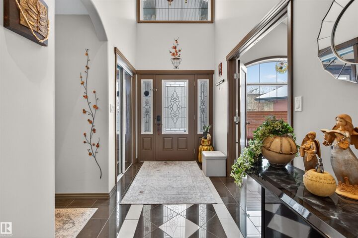 Property Photo: 1213 Cunningham Drive SW AB T6W 0R5