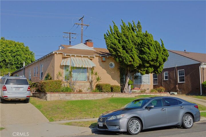 Property Photo:  11516 S St Andrews  CA 90047 