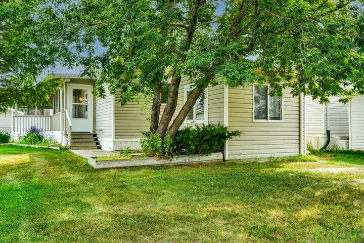 Property Photo: 132 Ranchwood Lane AB T1P 1M6
