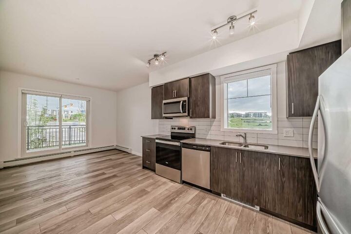 Property Photo:  3727 Sage Hill Drive NW 3204  AB T3R 1T7 