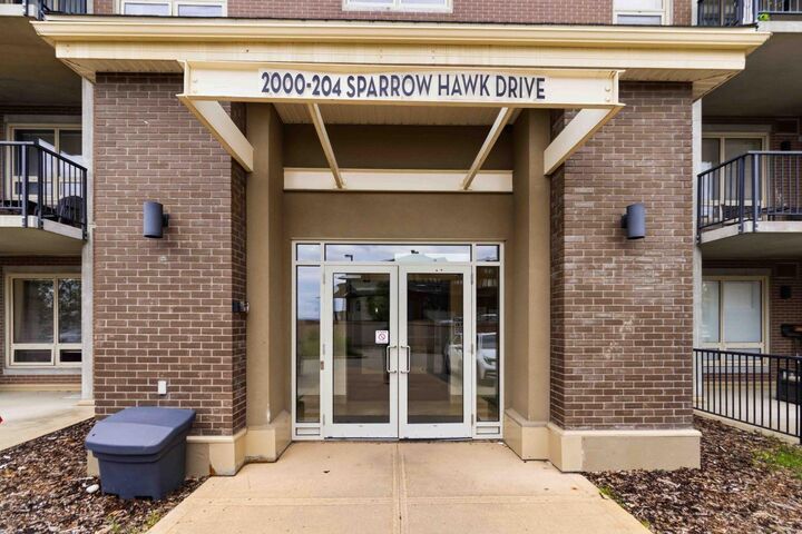 Property Photo: 204 Sparrow Hawk Drive 2308 AB T9K 0P1