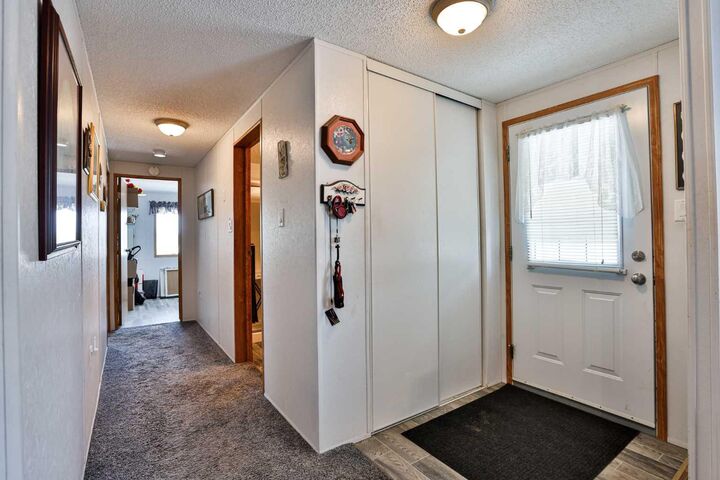 Property Photo: 402 Station Street AB T1M 1P5