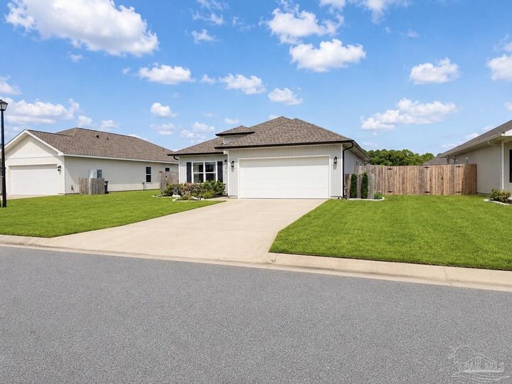 Property Photo: 9656 Sagewood Dr FL 32526