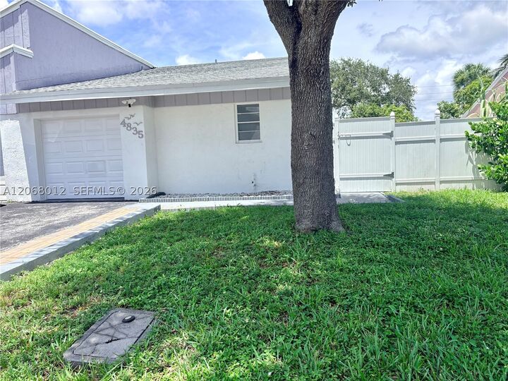 Property Photo:  4835 NW 6th Ct  FL 33445 