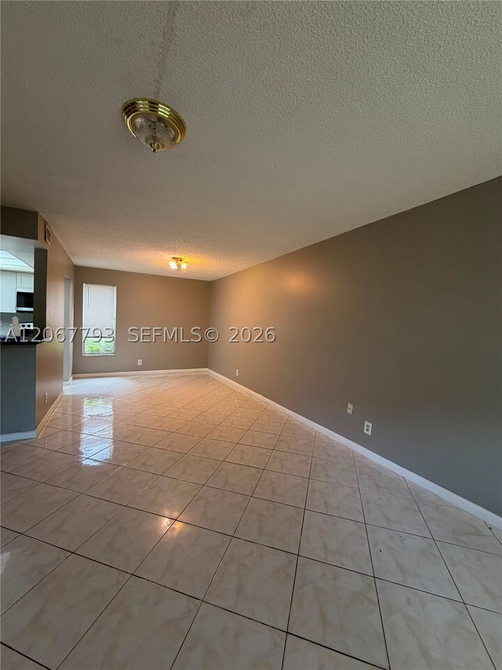 Property Photo: 3100 Riverside Dr 104 FL 33065