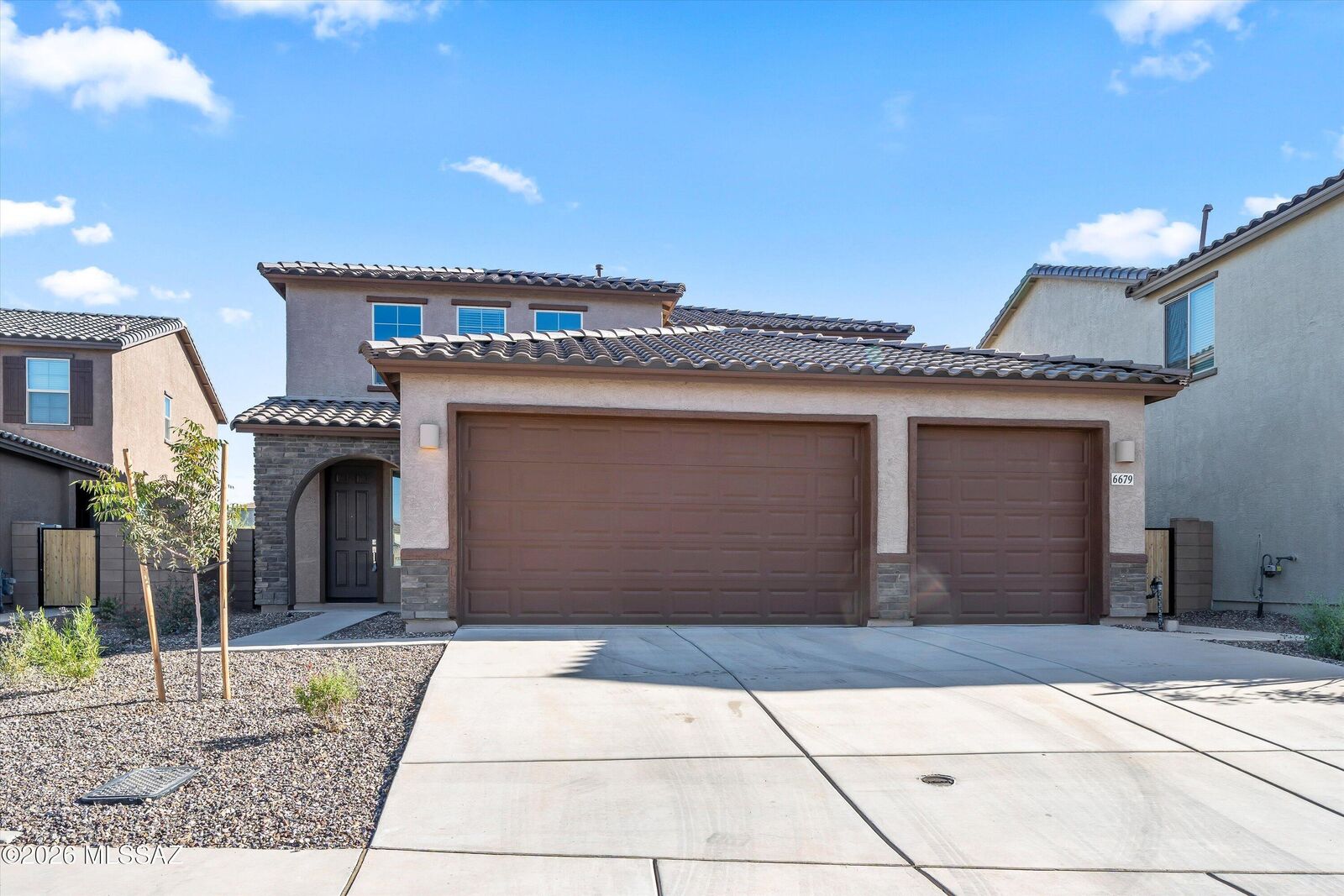 Property Photo:  6679 E Via De Ayate  AZ 85756 