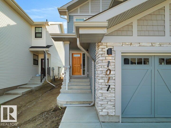 Property Photo: 1077 Cristall Crescent SW AB T6W 5S6