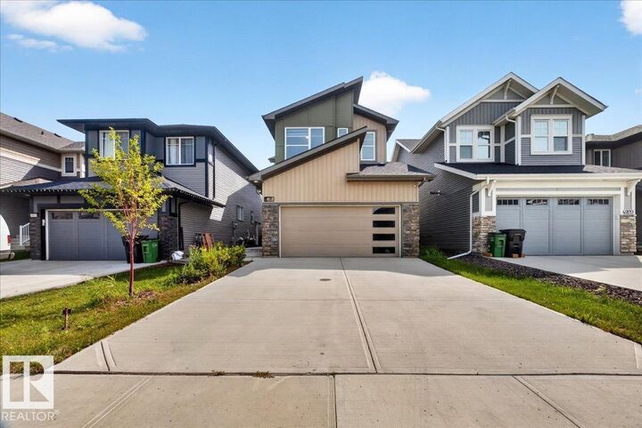 Property Photo: 4918 Kinney Road SW AB T6W 5H1