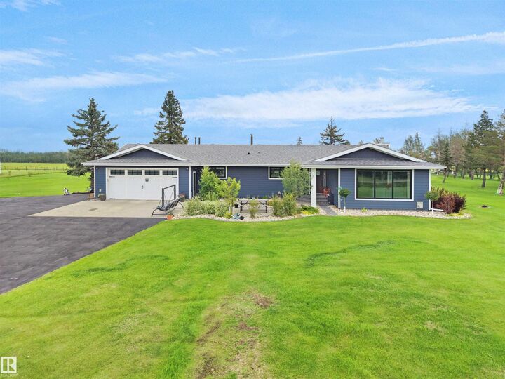 Property Photo: 1150-50242 Rge Rd 244A AB T4X 0P4