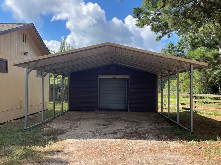 Property Photo: 19435 Keenan Cut Off Road TX 77316