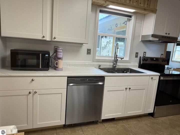 Property Photo:  702 Ash Street  MI 49656 