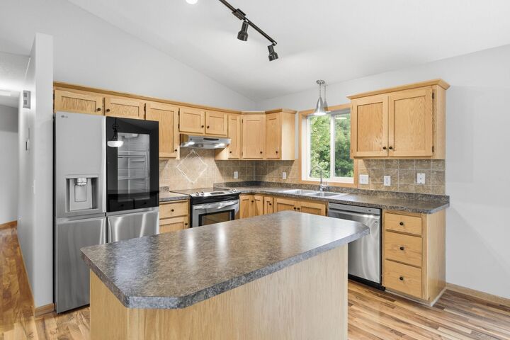 Property Photo: 909 Winsome Way NE MN 55040