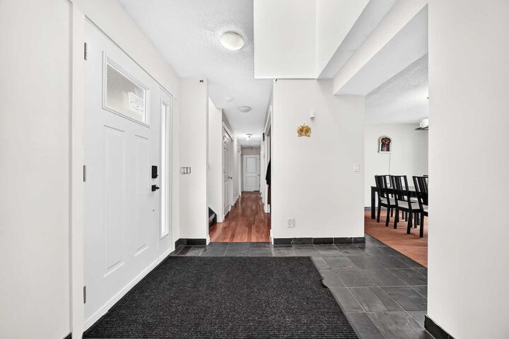 Property Photo: 55 Pineland Close NE AB T1Y 3H2