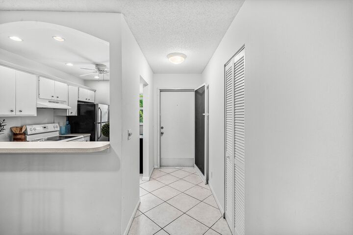Property Photo:  207 Tropic Isle Drive 208  FL 33483 