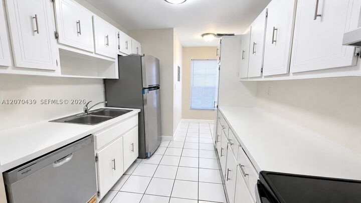 Property Photo:  7345 W 4th Ave 402  FL 33014 