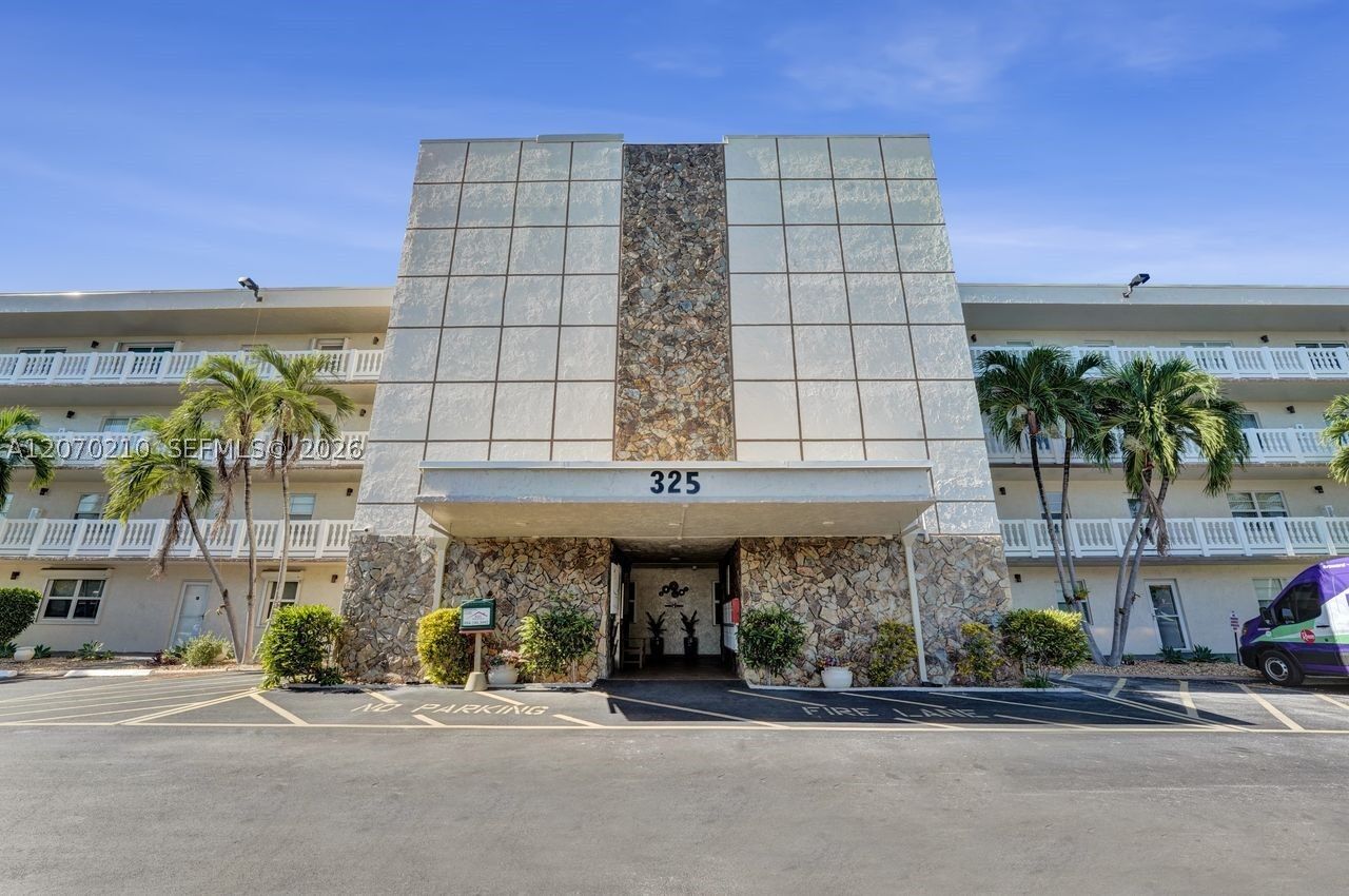 Property Photo:  325 SE 11th Ter 107  FL 33004 
