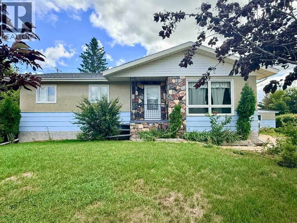 Property Photo: 215 14 Street AB T9W 1G4