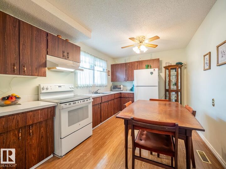 Property Photo: 5647 137 Avenue NW AB T5A 2H4