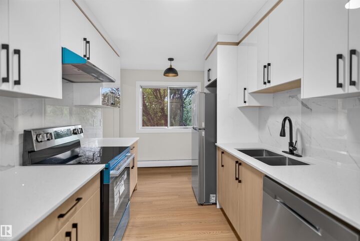 Property Photo:  11907 81 Street NW 305  AB T5B 2S7 