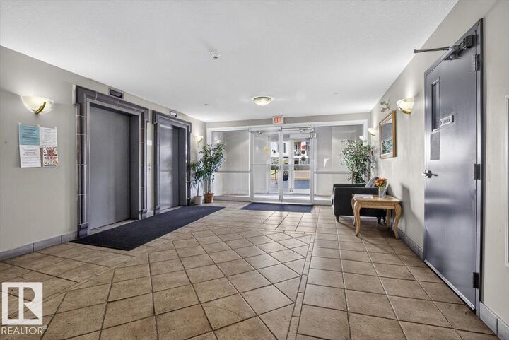 Property Photo: 237 Youville Drive NW 116 AB T6L 7G2
