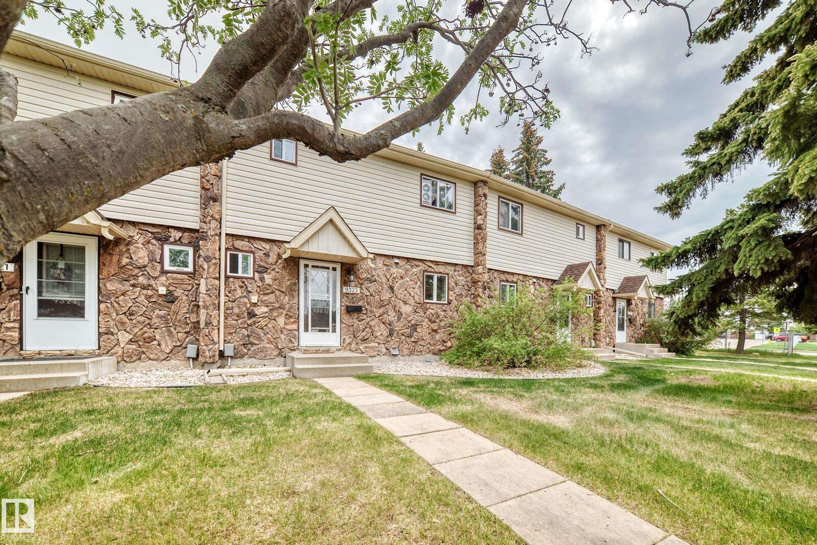Property Photo:  9323 Morinville Drive  AB T8R 1J9 