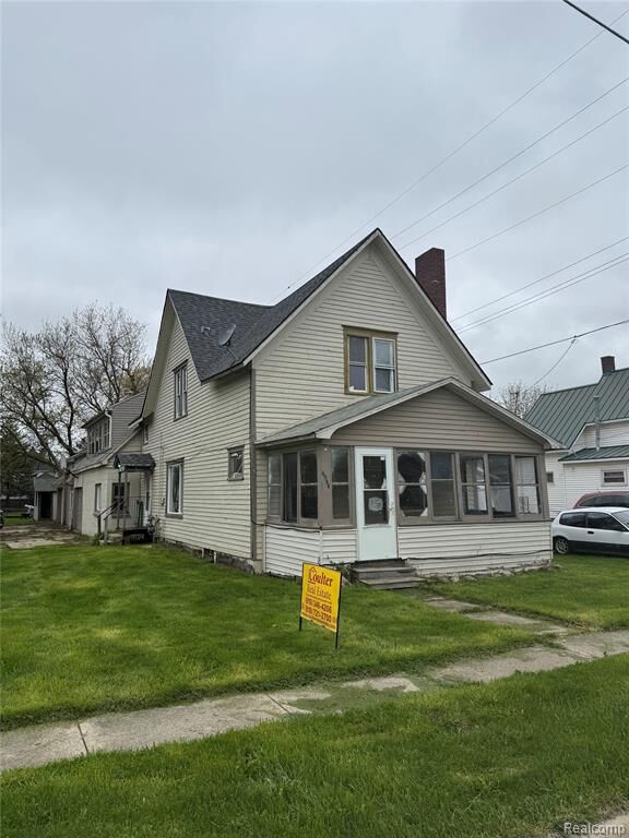 Property Photo:  6934 John Street  MI 48416 8787 