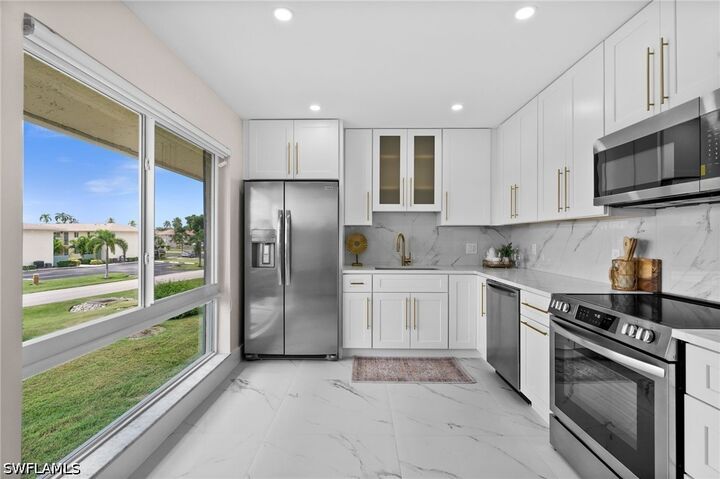 Property Photo:  105 Harrison Road 4  FL 34112 