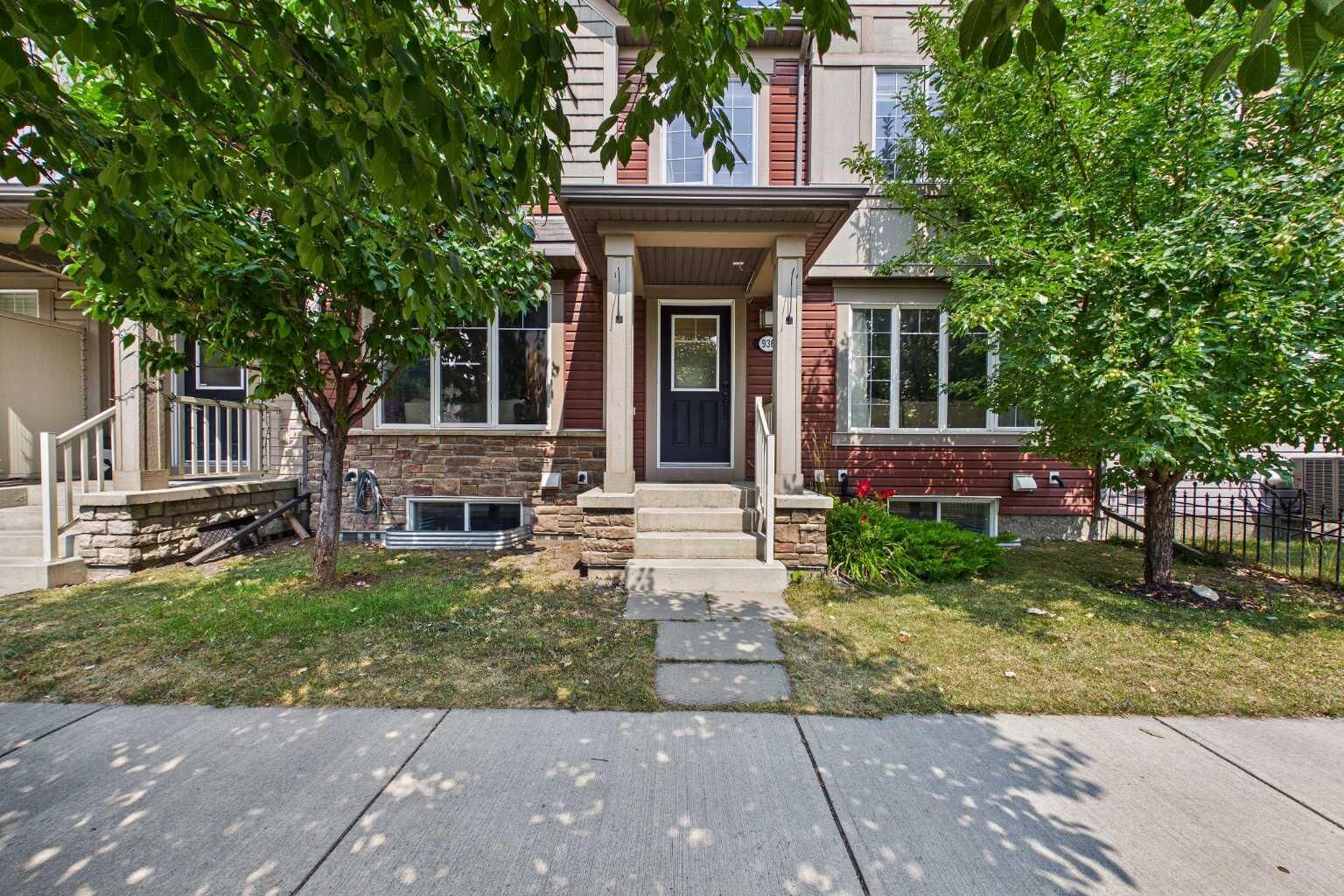 Property Photo: 936 Windsong Drive SW AB T4B 0P3