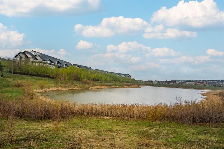 Property Photo: 45 Aspenmont Heights SW 209 AB T3H 0E6