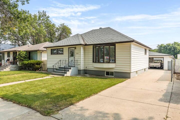 Property Photo:  109 4 Street SE  AB T1A 0J7 
