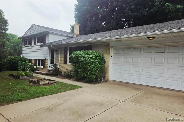 Property Photo:  25590 Wick Road  MI 48180 
