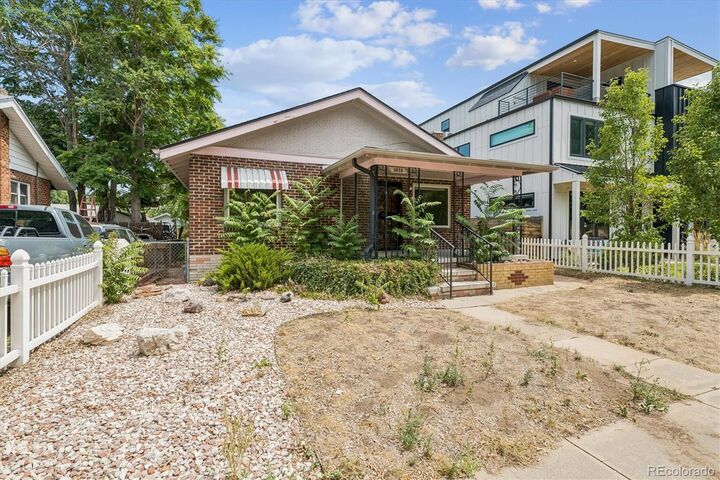 Property Photo: 3828 Wyandot Street CO 80211