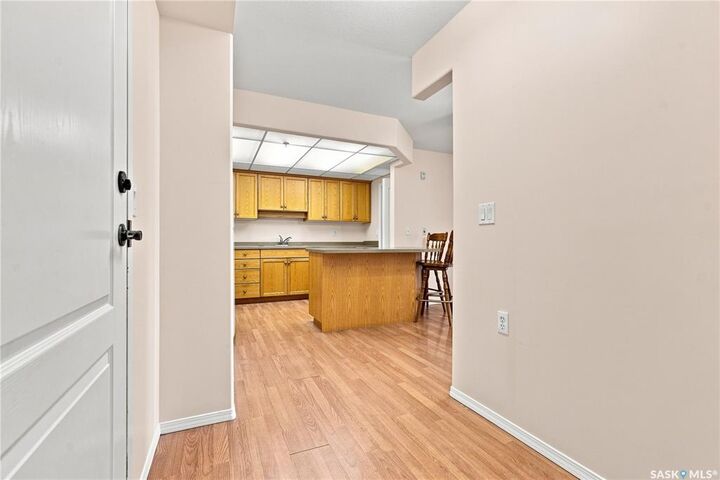 Property Photo: 1622A Acadia Drive 311 SK S7H 5H7